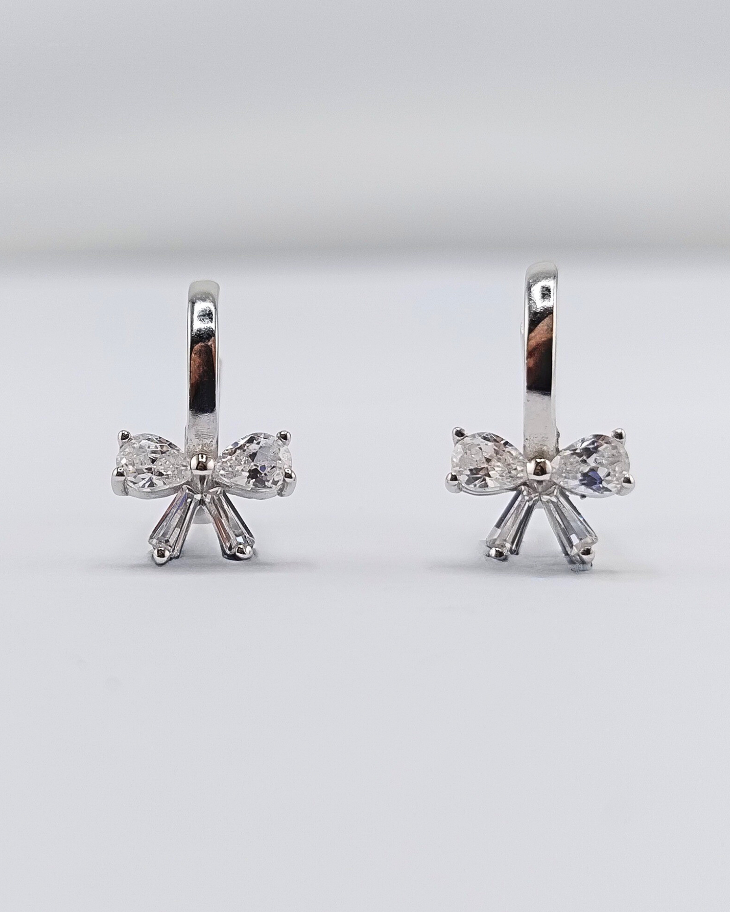 Izoa Small Bow Huggie Earrings