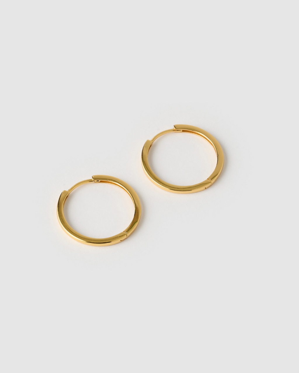 Izoa Large Solid Huggie Earrings