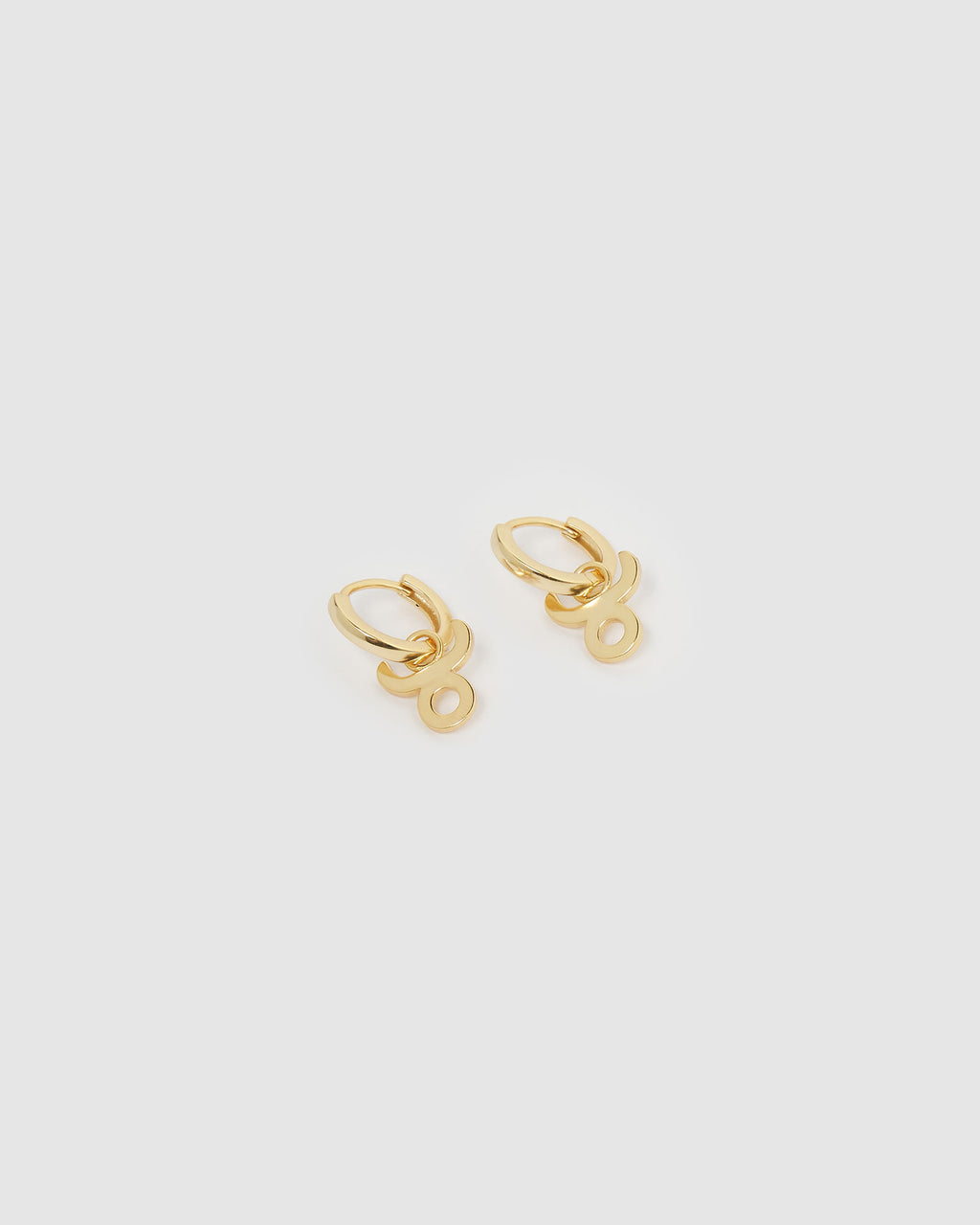 Izoa Taurus Star Sign Symbol Huggie Earrings Gold
